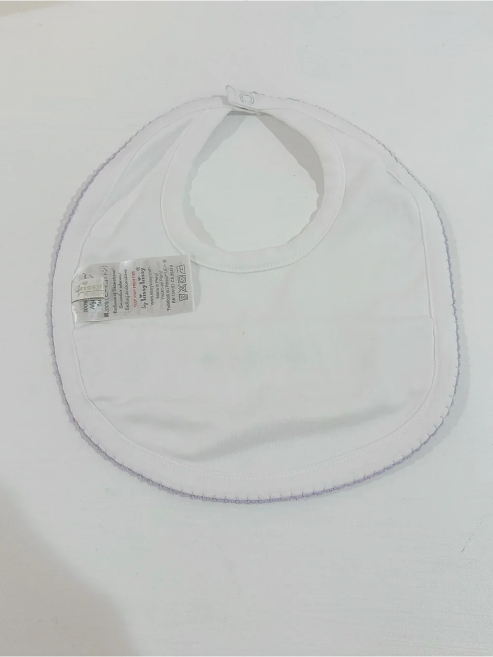 Kissy kissy White Baby Bib with Lavender Trim NWOT